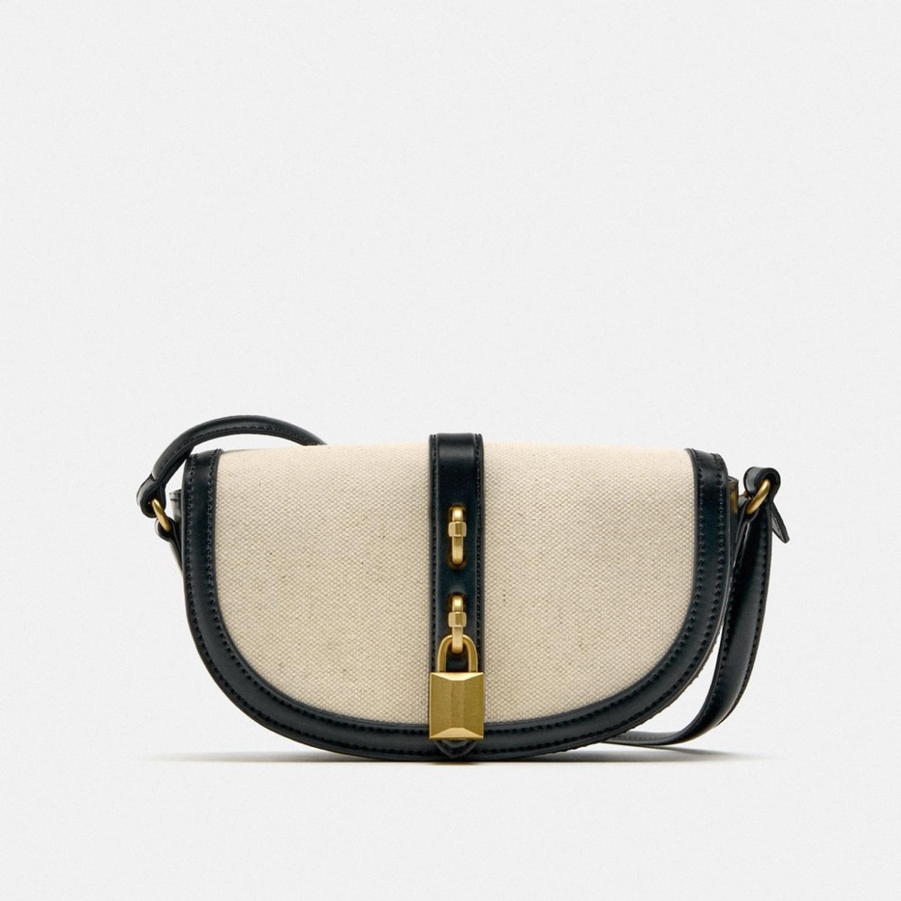 Zara Black and Cream Crossbody Bag with Lock detail